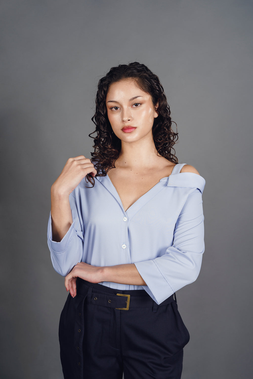 BLUSA ASIMETRICA CELESTE